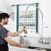 T&S Brass And Bronze Works Equip By T&S 5PR-8W14 Wall Mounted 35 3/4" High Pre-Rinse Faucet With 8" Adjustable Centers, 44" Hose, 14" Add-On Faucet, And 6" Wall Bracket