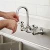 Regency Plumbing & Hardware Regency Wall Mount Faucet With 3 1/2" Swivel Gooseneck Spout, 8" Centers, And Install Kit