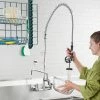 T&S Brass And Bronze Works Equip By T&S 5PR-8W12 Wall Mounted 35 3/4" High Pre-Rinse Faucet With 8" Adjustable Centers, 44" Hose, 12" Add-On Faucet, And 6" Wall Bracket